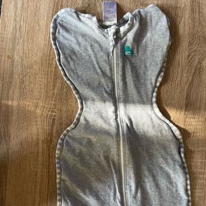 Small gray sleep sack.